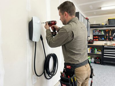 Tesla Wall Connector EV charger installation in garage