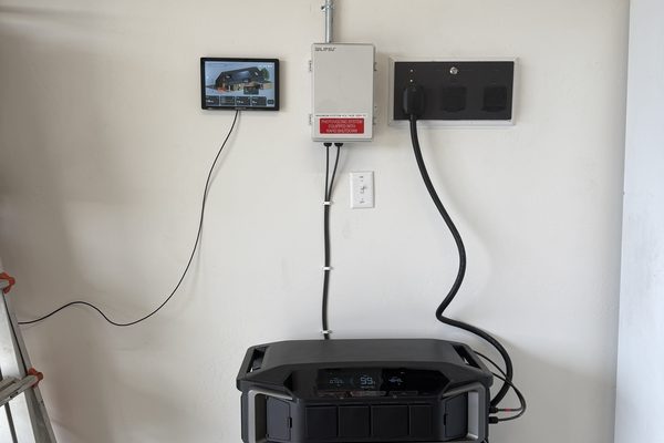 APS DS3 microinverter installed on solar panel racking