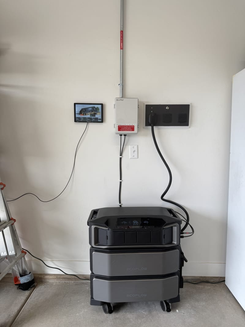 Complete EcoFlow DPU system with two SHP2 battery units tablet display and disconnect in garage